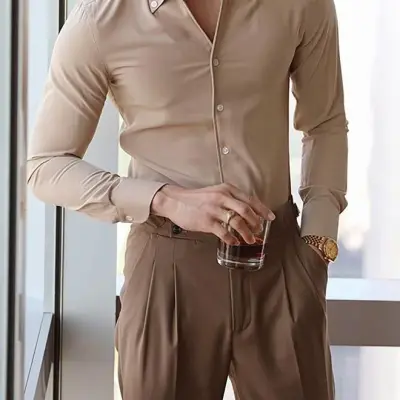 قميص سادة بأزرار أمامية وأكمام طويلة